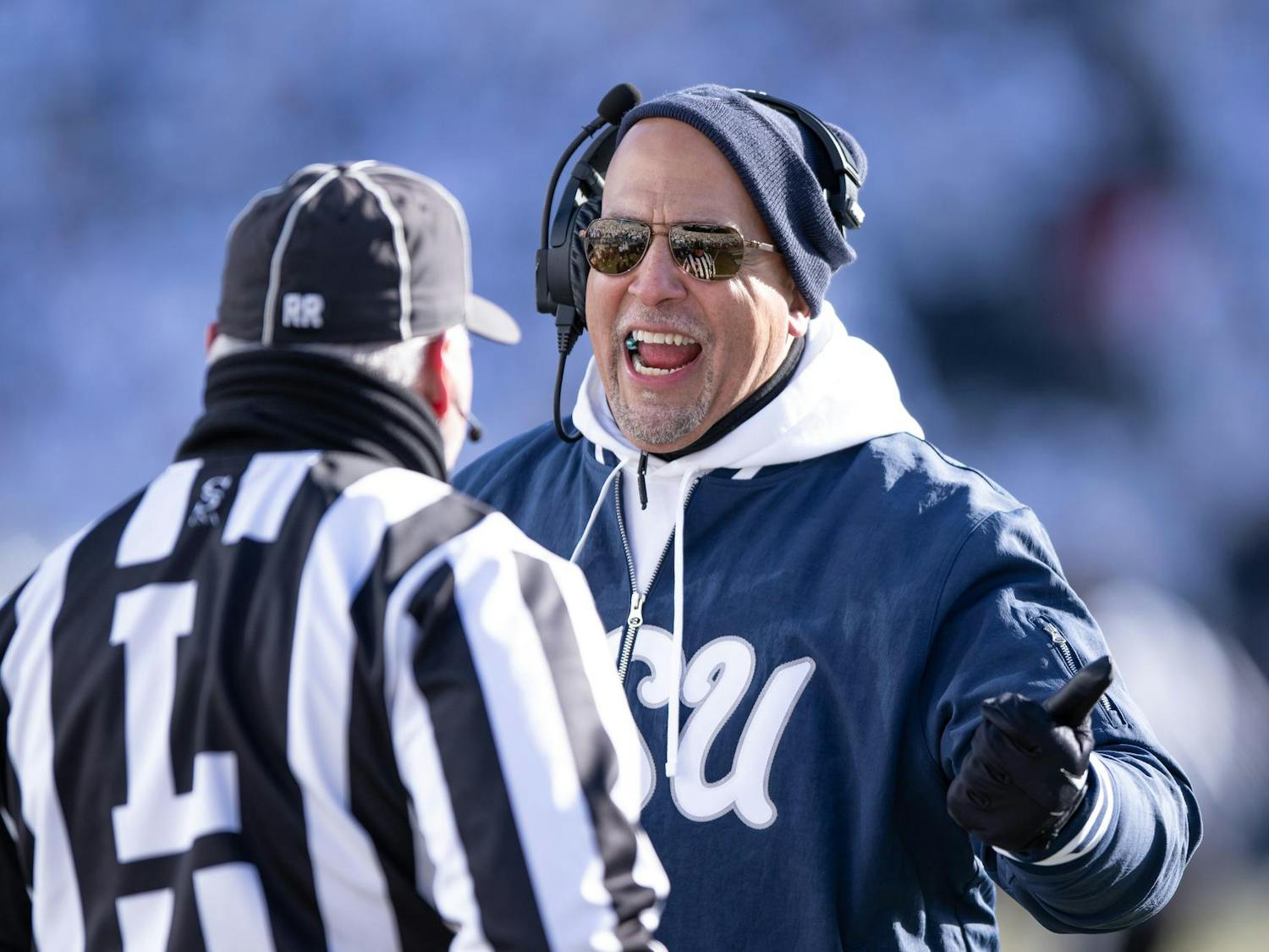 Former Penn State head coach James Franklin talks to a referee during a NCAA college football playoff game against SMU on Saturday, Dec. 21, 2024, in State College, Pa.