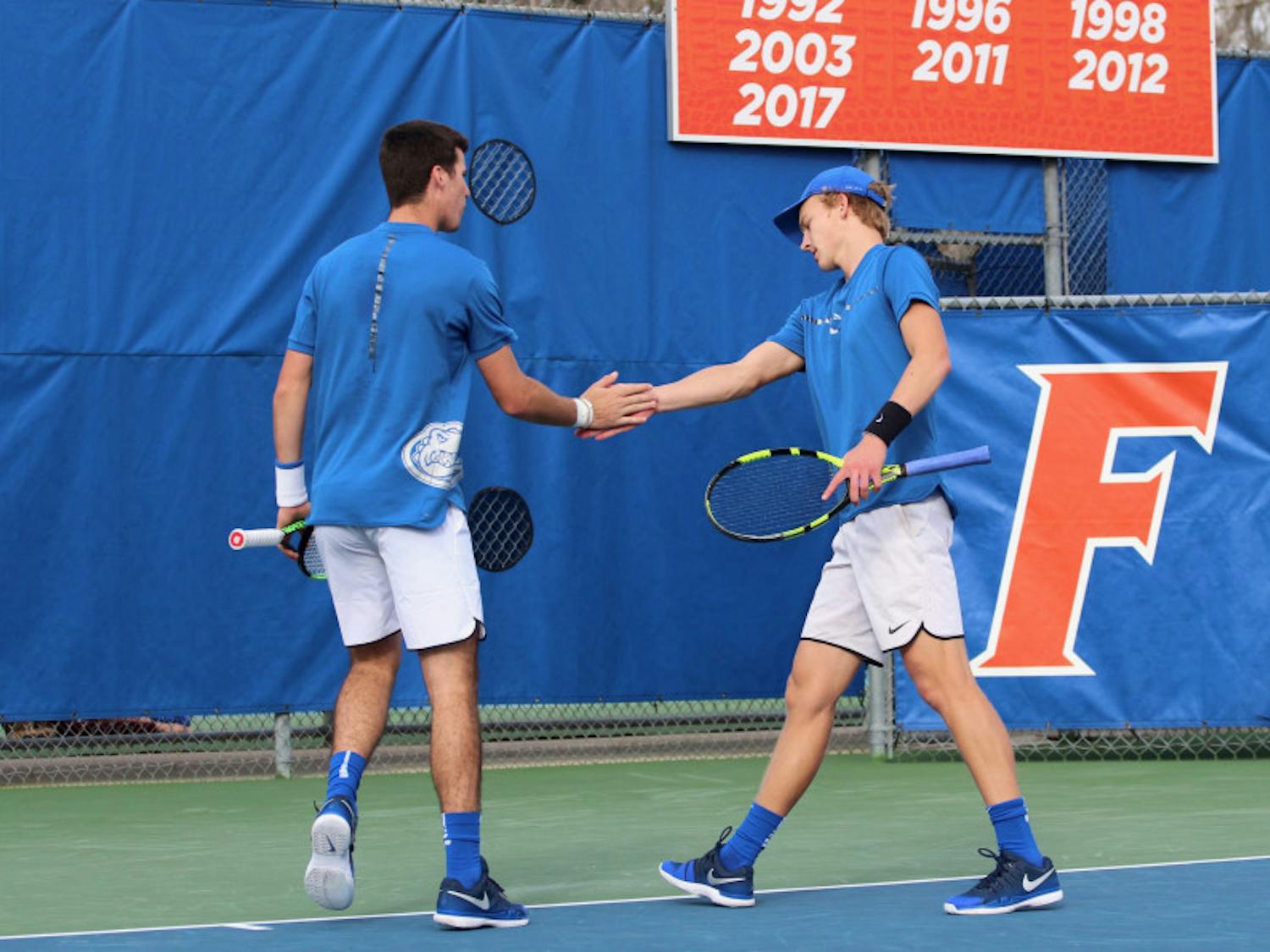 Junior Alfredo Perez (left) and sophomore Johannes Ingildsen (right) are onto the quarterfinals of the NCAA Doubles Championships along with fellow Gators pairing of junior McClain Kessler and freshman Duarte Vale.