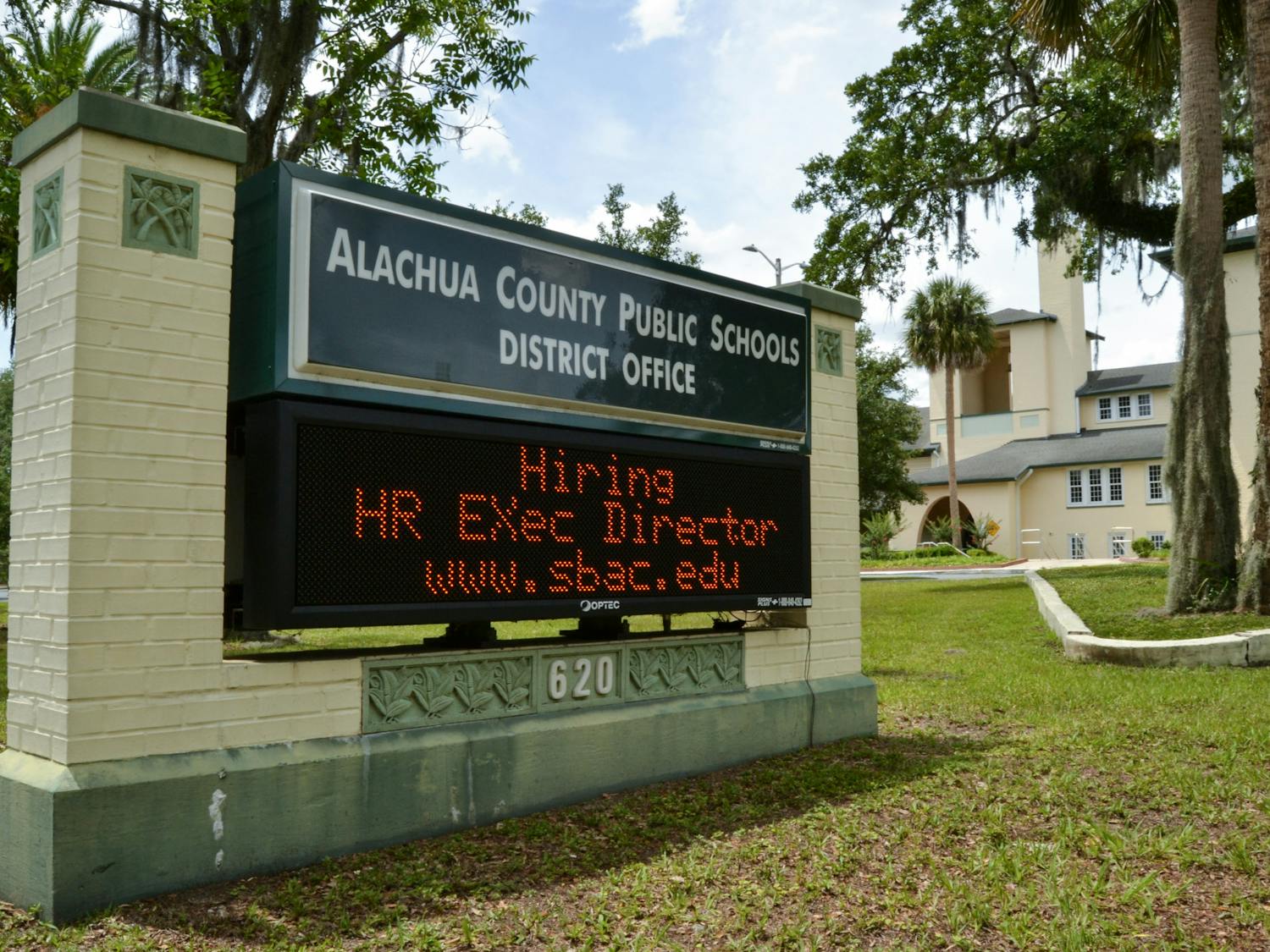 A digital sign in front of the Alachua County Public Schools district office building reads “Hiring HR Exec Director” on Sunday, June 6, 2021.