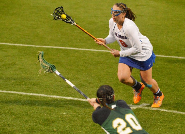 Junior midfielder Shannon Gilroy drives toward the goal during Florida’s 21-5 win against Jacksonville on Feb. 12 at Donald R. Dizney Stadium.