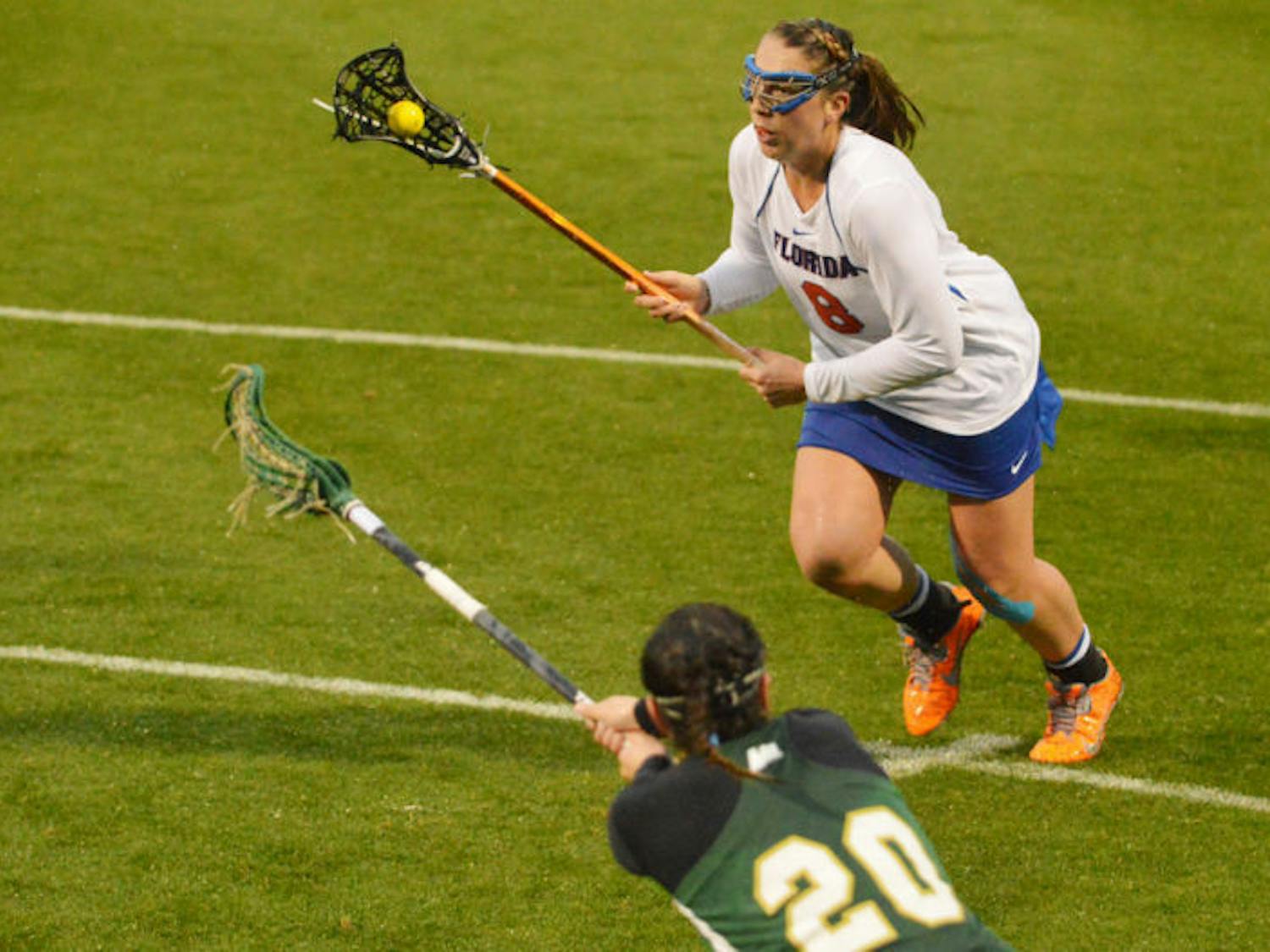 Junior midfielder Shannon Gilroy drives toward the goal during Florida’s 21-5 win against Jacksonville on Feb. 12 at Donald R. Dizney Stadium.