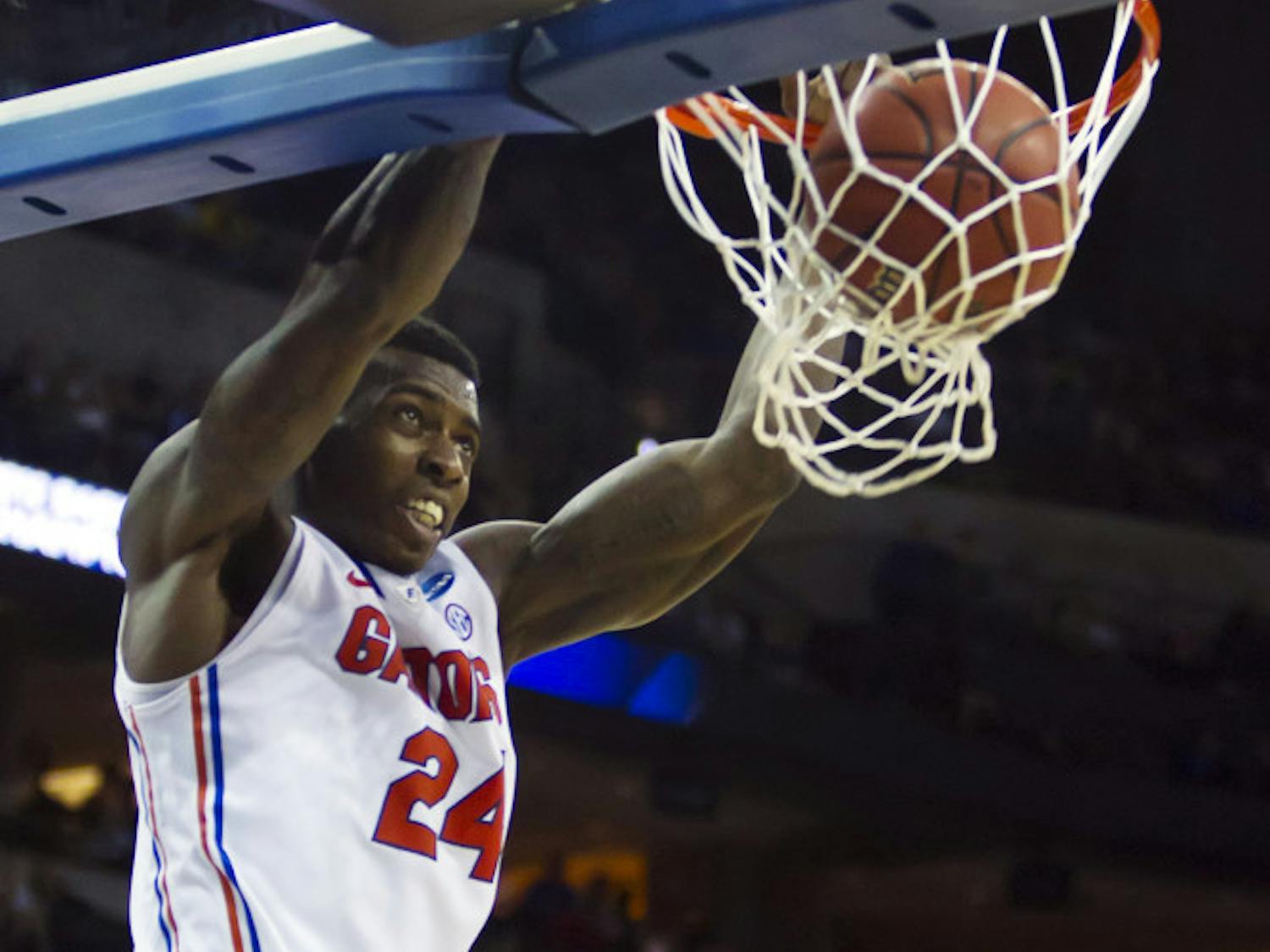 Florida's Casey Prather (24) dunks against Virginia during an NCAA college basketball tournament game at CenturyLink Center in Omaha, Neb., Friday, March 16, 2012. Florida won 71-45. (AP Photo/The Kansas City Star, David Eulitt)