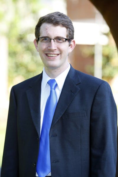 Tim Mason poses for a photo on Monday afternoon.