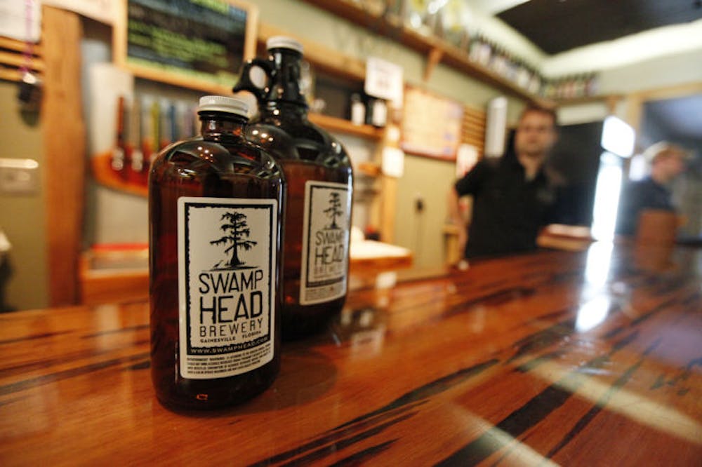 <p>Both 32-ounce jugs and one-gallon jugs of beer, sold at Swamp Head Brewery, are legal container sizes in Florida. Lobbyists are trying to legalize the 64-ounce size beverages.</p>