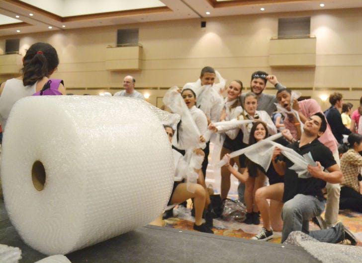 UF students attempt to break the Guinness World Record for the most people popping bubble wrap at one time in the Reitz Union Grand Ballroom on Tuesday evening.&nbsp;