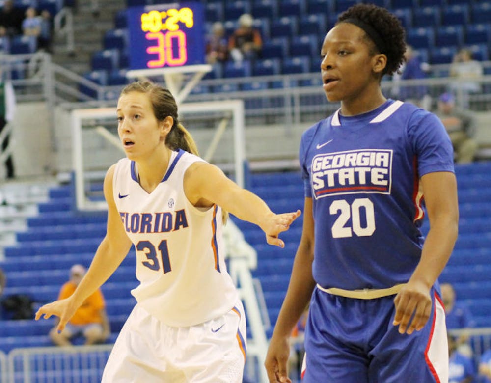 <p>Junior forward Lily Svete (31) guards sophomore guard Kayla Nolan (20) during Florida’s 84-65 victory against Georgia State on Nov. 11 in the O’Connell Center.</p>