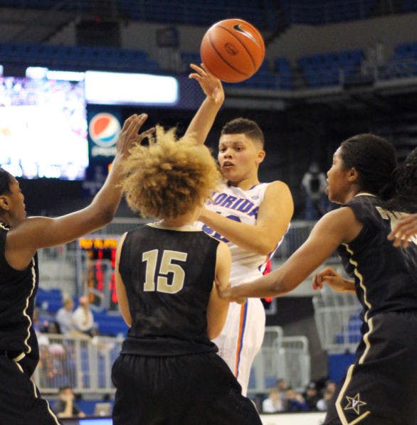 Sydney Moss (40) attempts a pass during Florida’s 68-57 loss to Vanderbilt on Thursday in the O’Connell Center. Moss notched her third career double-double in Florida's 67-56 loss at South Carolina on Sunday.&nbsp;