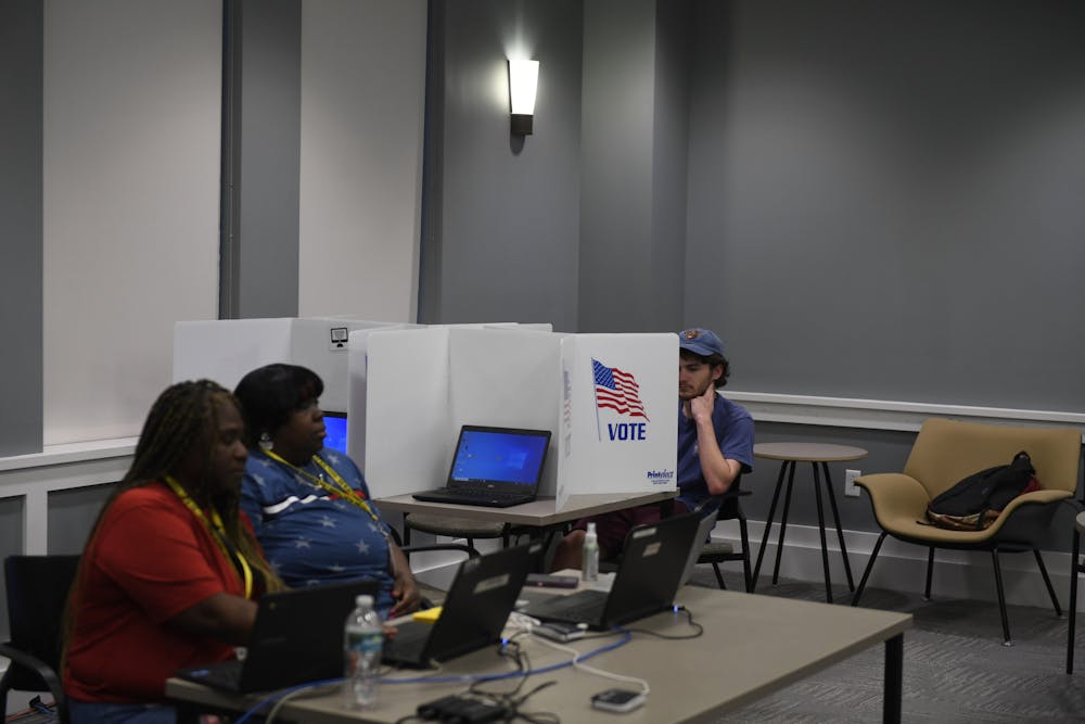 <p>A student attends the second day of voting for the UF Student Government election at Heavener Hall on Wednesday, Feb. 28, 2024.</p>