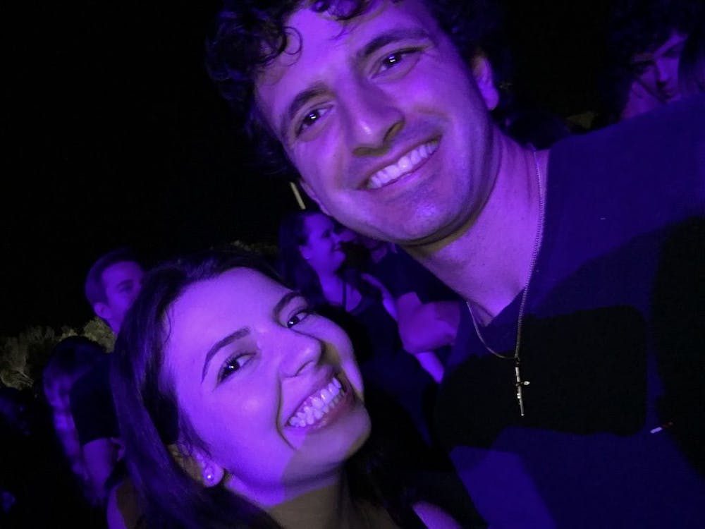 <div>Christina Morales, as a staff writer at The Alligator, and Tyler Pratt on one of their first dates at the UF X Ambassadors concert on Flavet Field in 2017.</div>
<div dir="ltr">&nbsp;</div>