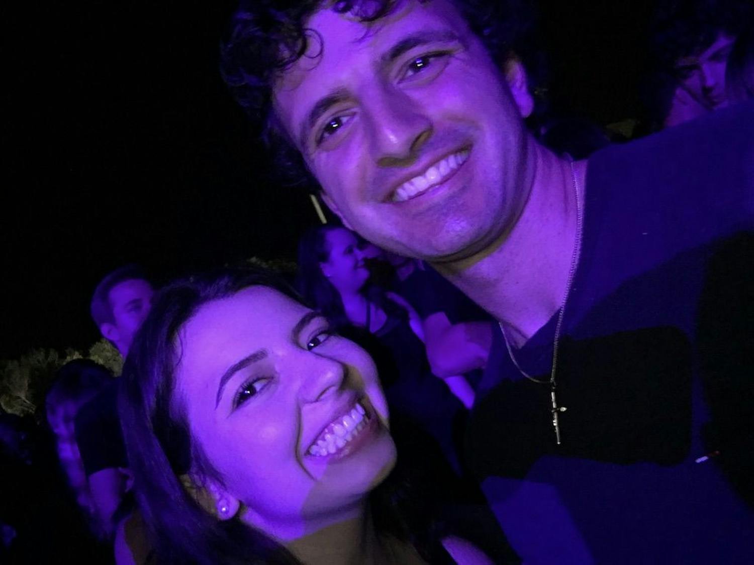 Christina Morales, as a staff writer at The Alligator, and Tyler Pratt on one of their first dates at the UF X Ambassadors concert on Flavet Field in 2017.
