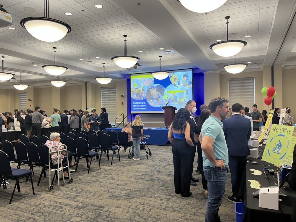 <p>Students in the Innovation Academy present their final projects to guests and judges at the Summer Catalyst Showcase Thursday, June 9, 2022.</p>