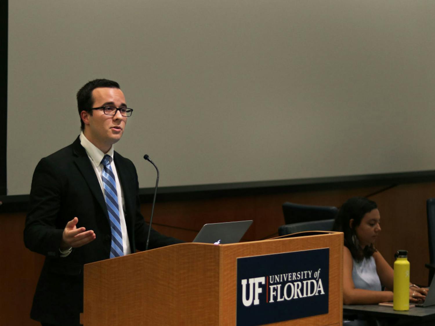 Ben Lima, a 21-year-old political science senior and Inspire Party senator-elect for District D, speaks out against the use of student activities and service fees funds to host Donald Trump Jr. and Kimberly Guilfoyle as Accent speakers at a Student Government meeting Tuesday night. 