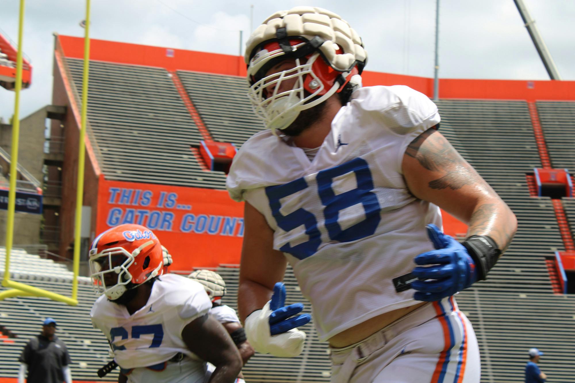 Offensive linemen redshirt sophomore Austin Barber and junior Richie Leonard IV compete in drills before Florida football’s Fall scrimmage Friday, Aug. 18, 2023. 