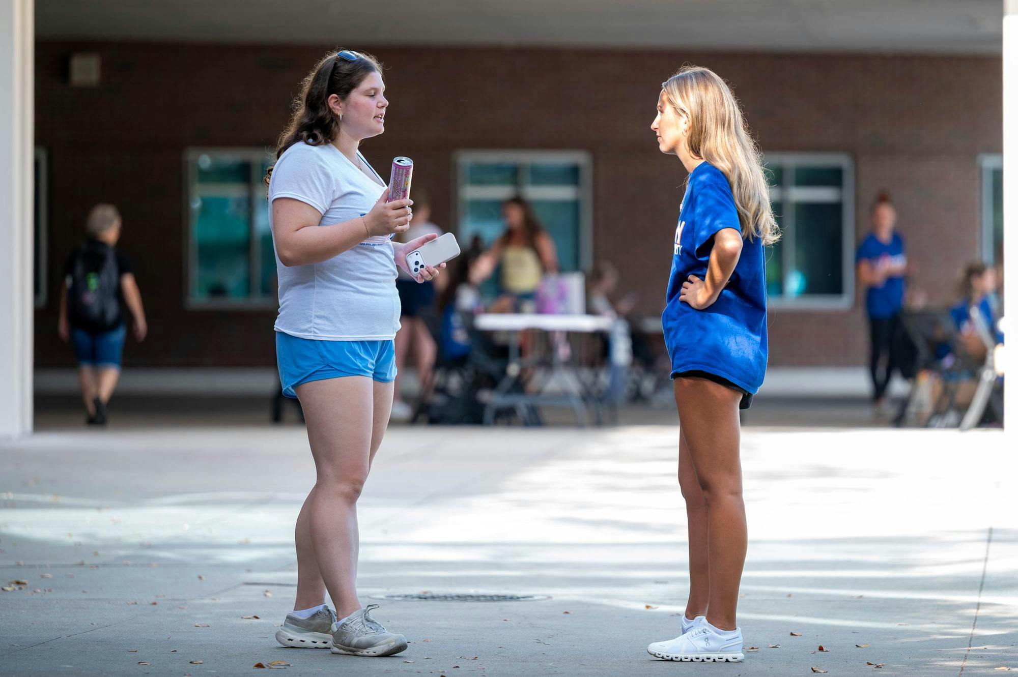 Members of the Vision Party speak to each other outside the Reitz Union, Wednesday, Sept. 30, 2026, in Gainesville, Fla.