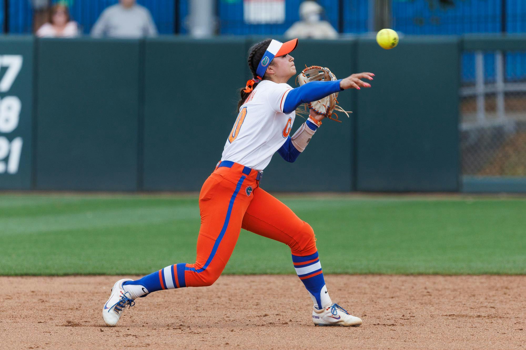 Florida Gators infielder Gabi Comia fields throws to first base during an NCAA softball game against Mississippi State, Sunday, April 5, 2026, in Gainesville, Fla.