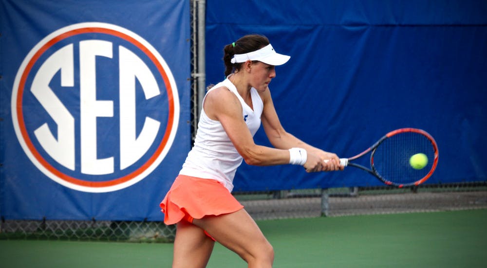 <p>Ingrid Neel hits a backhand during Florida's 4-2 win against Oklahoma State on Feb. 18, 2017, at the Ring Tennis Complex.</p>