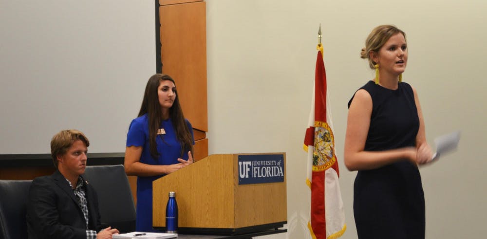Student Government Budget and Appropriations Committee Chairwoman Emily Dunson gives the committee’s report. Dunson addressed the reason for budget increases in her report. (June 7,2018)