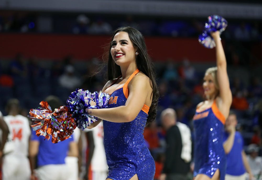<p>Amanda Gonzalez, a Florida Dazzler, performs a routine with the rest of the team.</p>