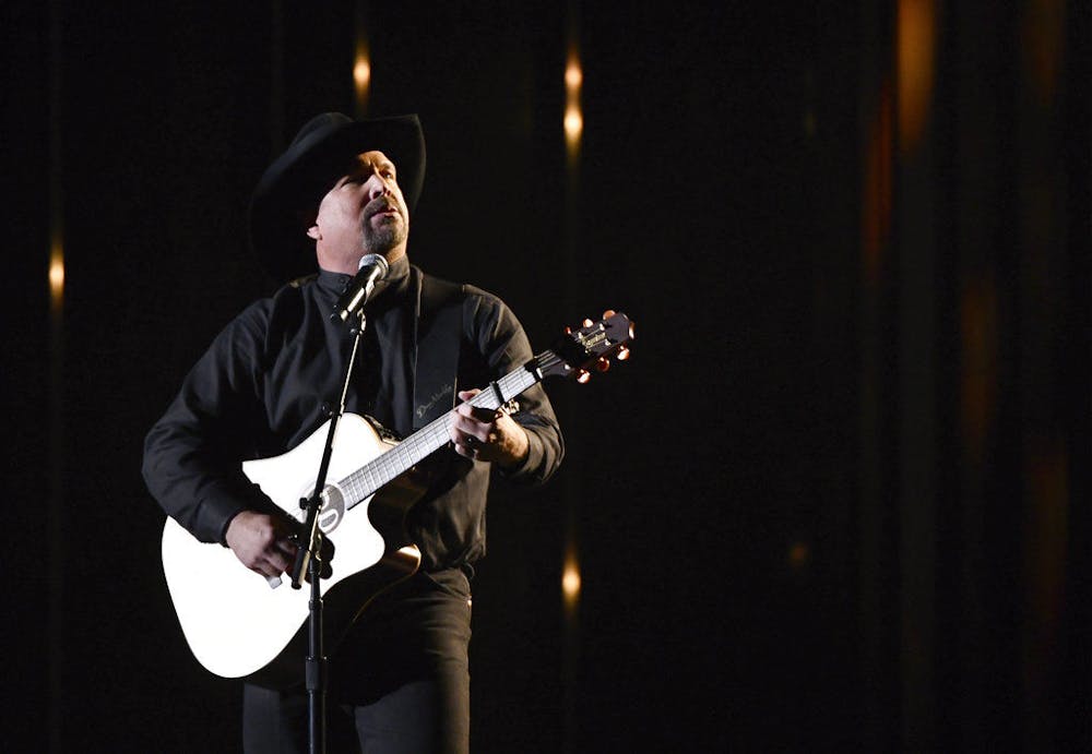 <p>Garth Brooks performs "Stronger Than Me" at the 52nd annual CMA Awards at Bridgestone Arena on Wednesday, Nov. 14, 2018, in Nashville, Tenn. (Photo by Charles Sykes/Invision/AP)</p>