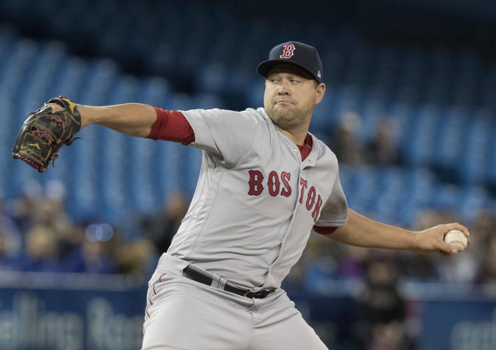 Former Gators left-hander Brian Johnson pitches during Boston’s 8-7 win against the Toronto Blue Jays on April 18, 2017, at the Rogers Centre.