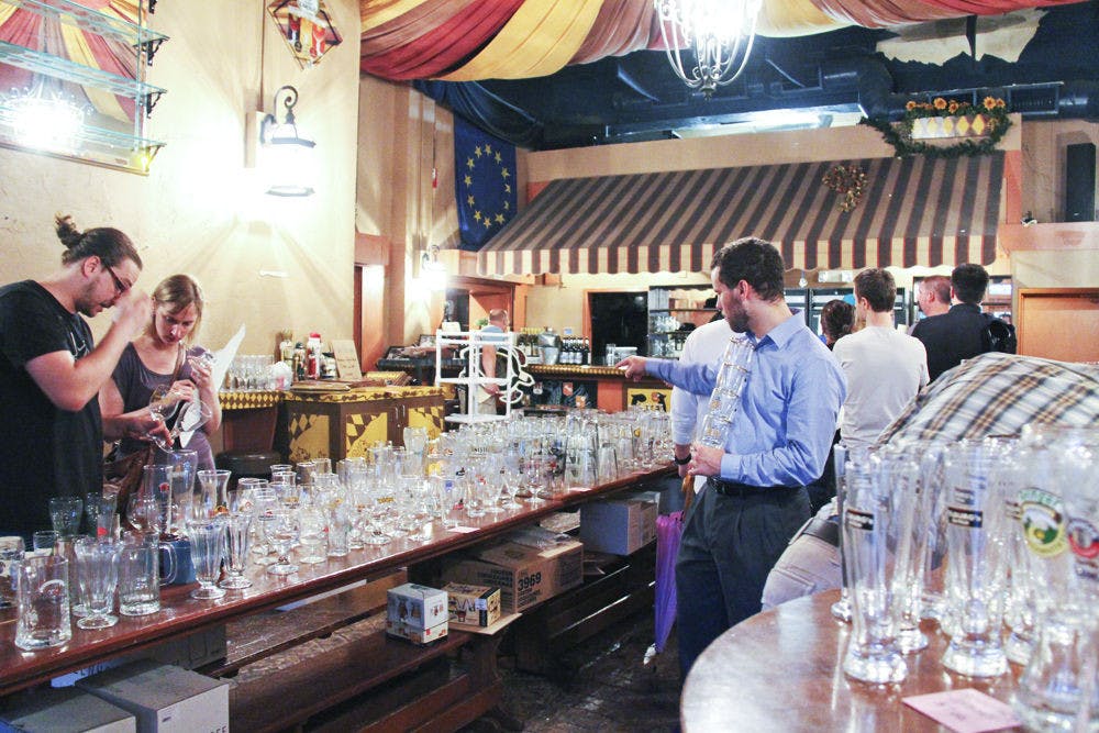 <p class="p1">Customers search through glassware and memorabilia at the Stubbies &amp; Steins closeout sale Monday. The pub, which opened in 2003, closed on Saturday, leaving bargoers sad but thankful.</p>