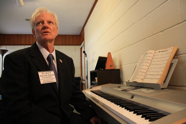City Commission candidate Harold Saive works on a song for Occupy Gainesville in his study. The song, written by Duane Schwingel, another Occupy Gainesville protester, debuted on Saive's YouTube channel GainesvilleNews. "It's in the embryonic stages right now," Saive said.