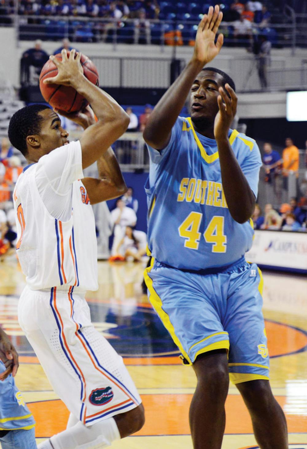 <p>Kasey Hill attempts a shot during Florida’s 67-53 victory against Southern on Monday in the O’Connell Center. Hill suffered a high ankle sprain in the game.</p>