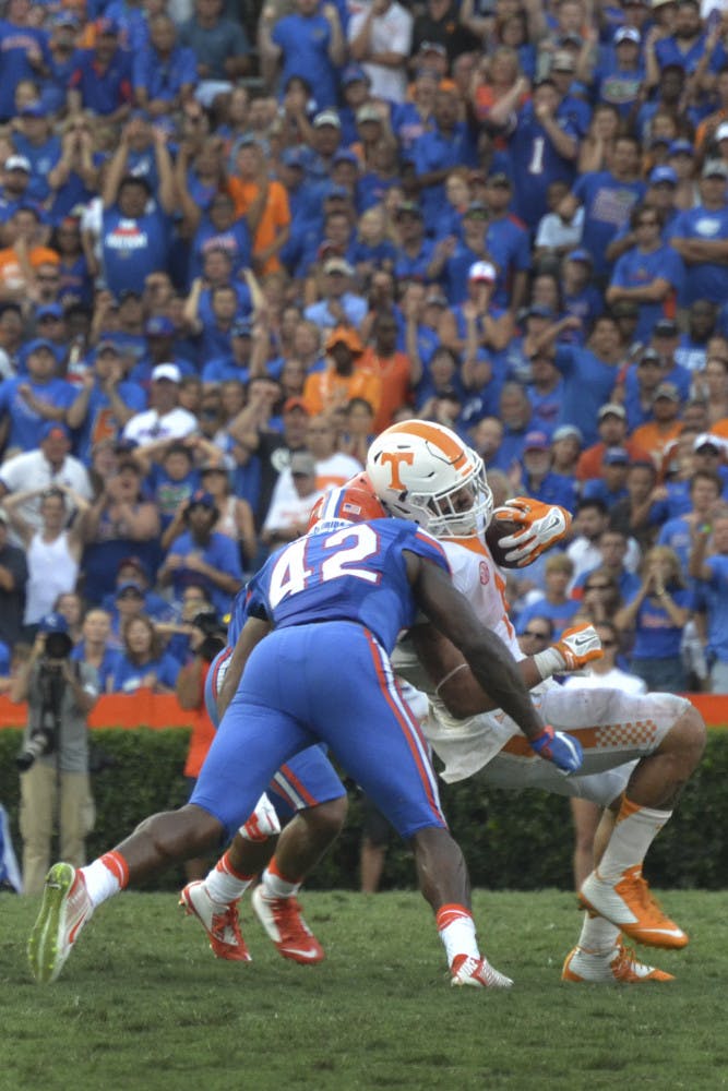 UF safety Keanu Neal makes a tackle during Florida's 28-27 win against Tennessee on Sept. 26, 2015, at Ben Hill Griffin Stadium.