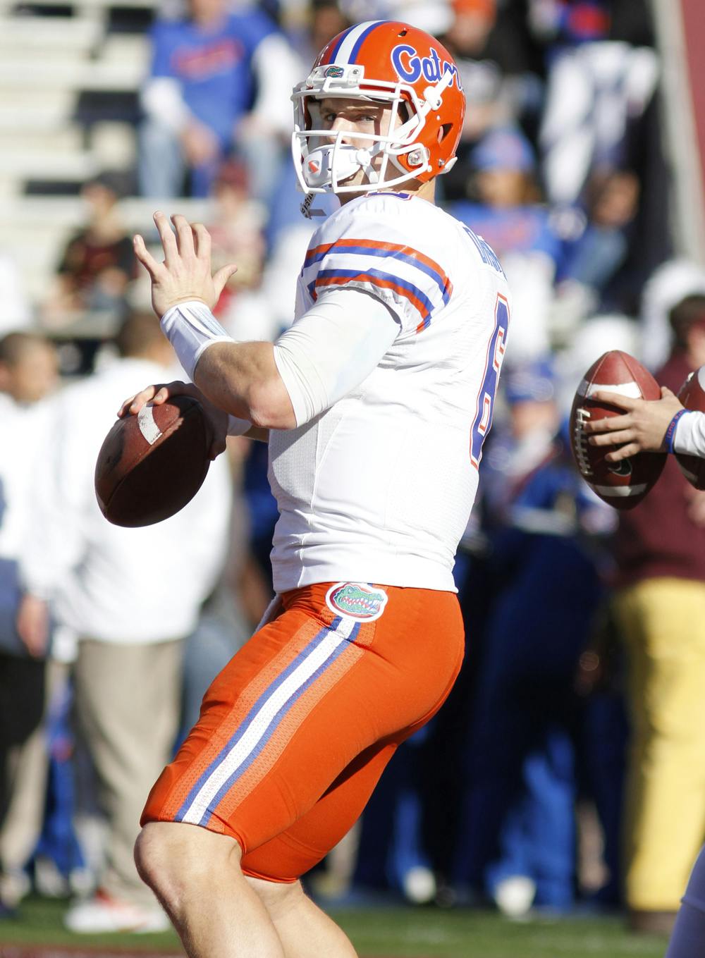 <p>Jeff Driskel tosses a football during warm-ups prior to Florida’s 37-26 victory against Florida State on Nov. 24 in Doak Campbell Stadium. Florida is ranked No. 10 to start the season.</p>