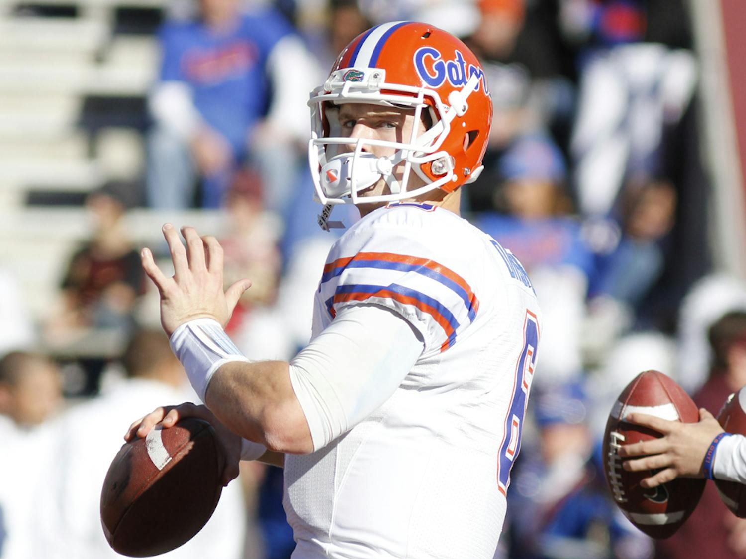 Jeff Driskel tosses a football during warm-ups prior to Florida’s 37-26 victory against Florida State on Nov. 24 in Doak Campbell Stadium. Florida is ranked No. 10 to start the season.