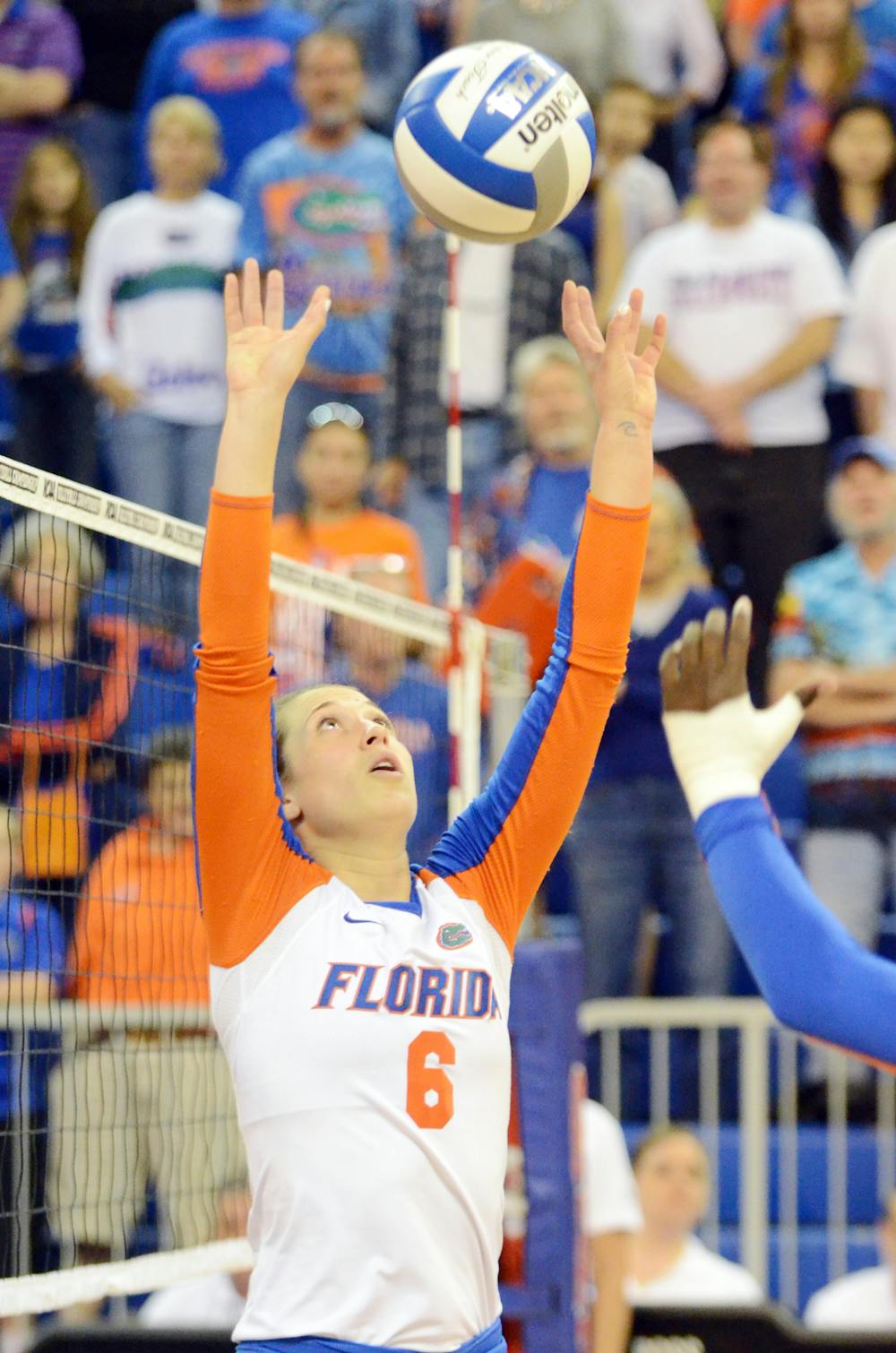 <p>Mackenzie Dagostino sets the ball during Florida's 3-0 win against Alabama State during the first round of the NCAA Tournament on Friday in the O'Connell Center.</p>