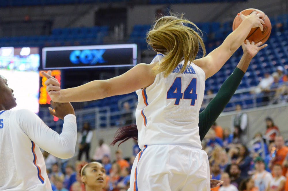 Haley Lorenzen blocks a shot during Florida's win against Jacksonville.