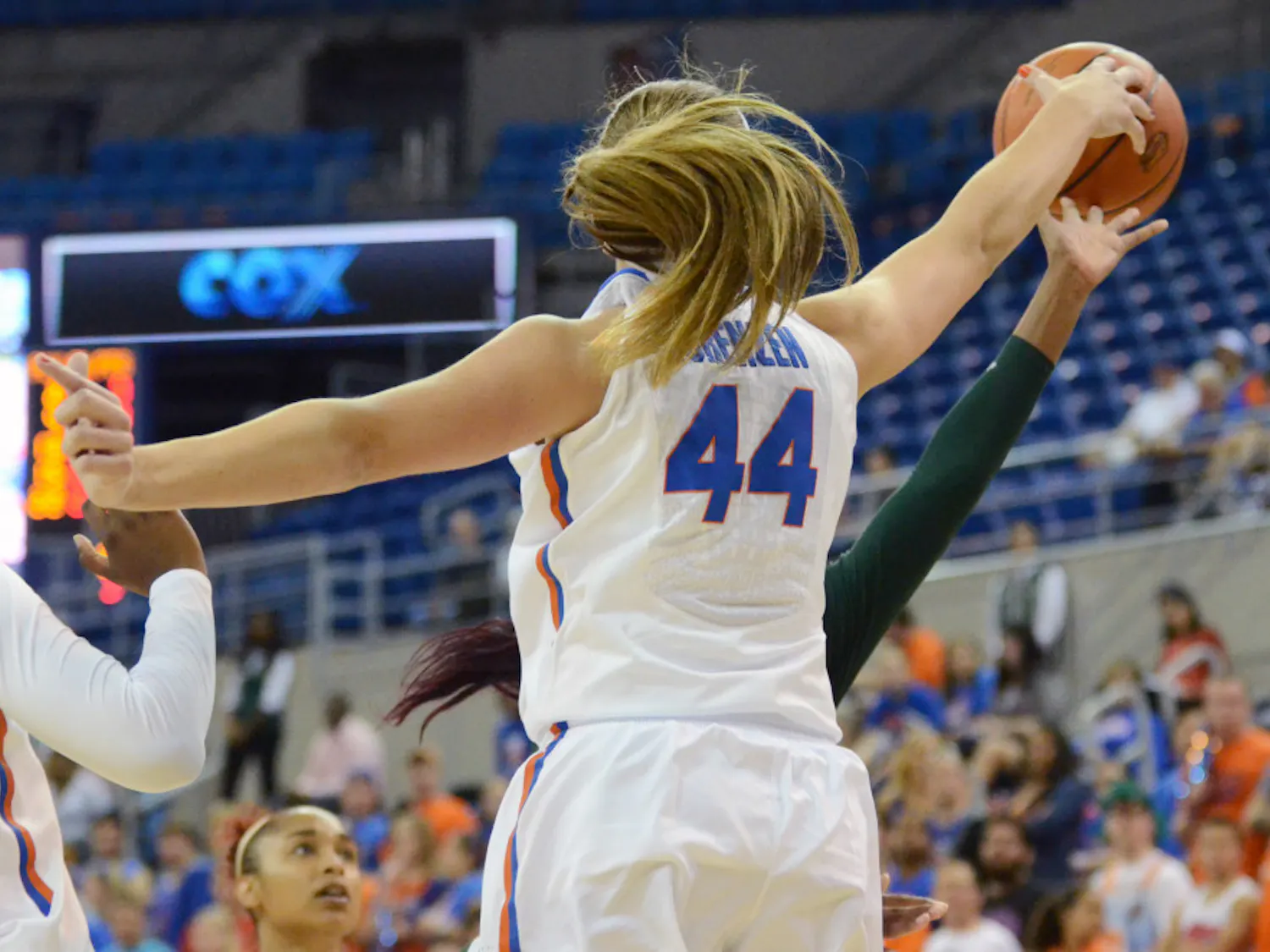 Haley Lorenzen blocks a shot during Florida's win against Jacksonville.