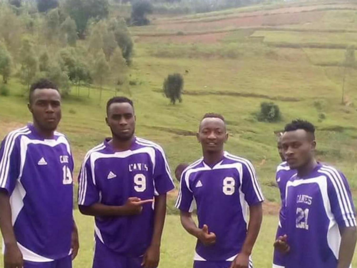 The Hurricanes For Jesus soccer team pose with their Gainesville High School soccer uniforms.