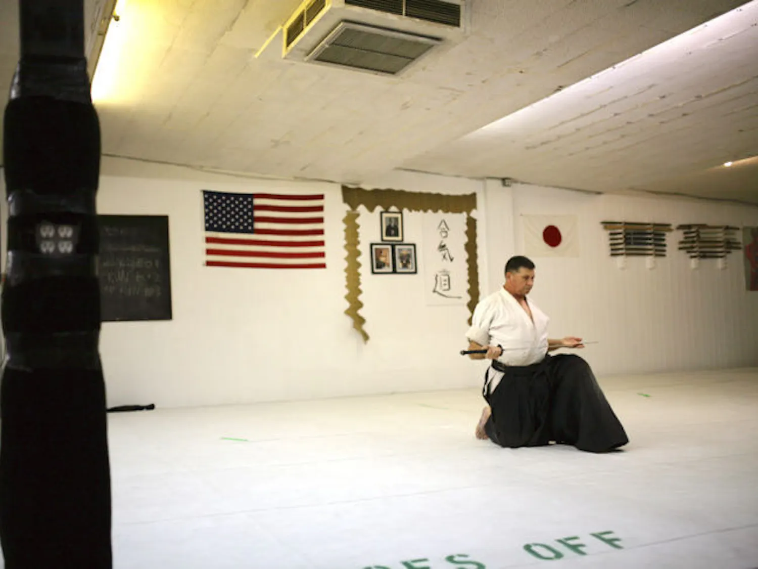Sensei Tom Huffman, a fourth-degree black belt in Iwama and Nishio styles of aikido, practices iaido at the Unified Training Center on Thursday. Iaido is the art of drawing and manipulating the Japanese sword. Adult classes are held Mondays and Wednesdays at 7:30 p.m. Free classes are held each Thursday at 7:30 p.m.