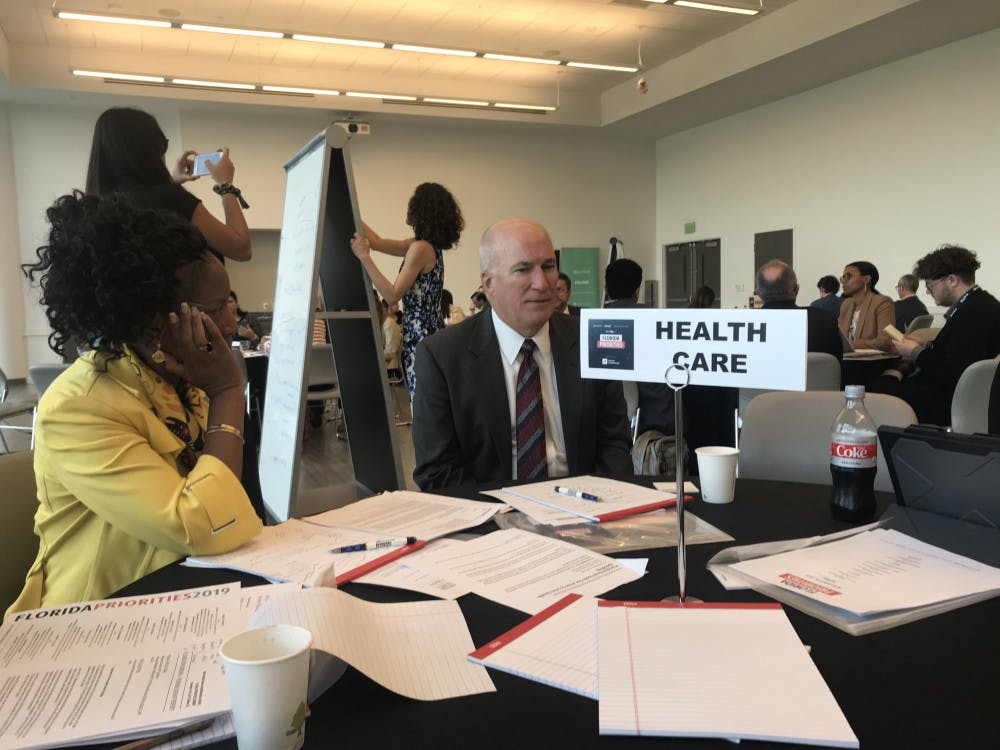 <p><span>Former Executive Director of We Care Manatee Victoria Kasdan (left) and group CEO of Florida Medical Center and Tenet Health Miami-Dade Group Jeffrey Welch (right) discuss ways Florida can improve its healthcare system during the Florida Priorities Summit. </span></p>