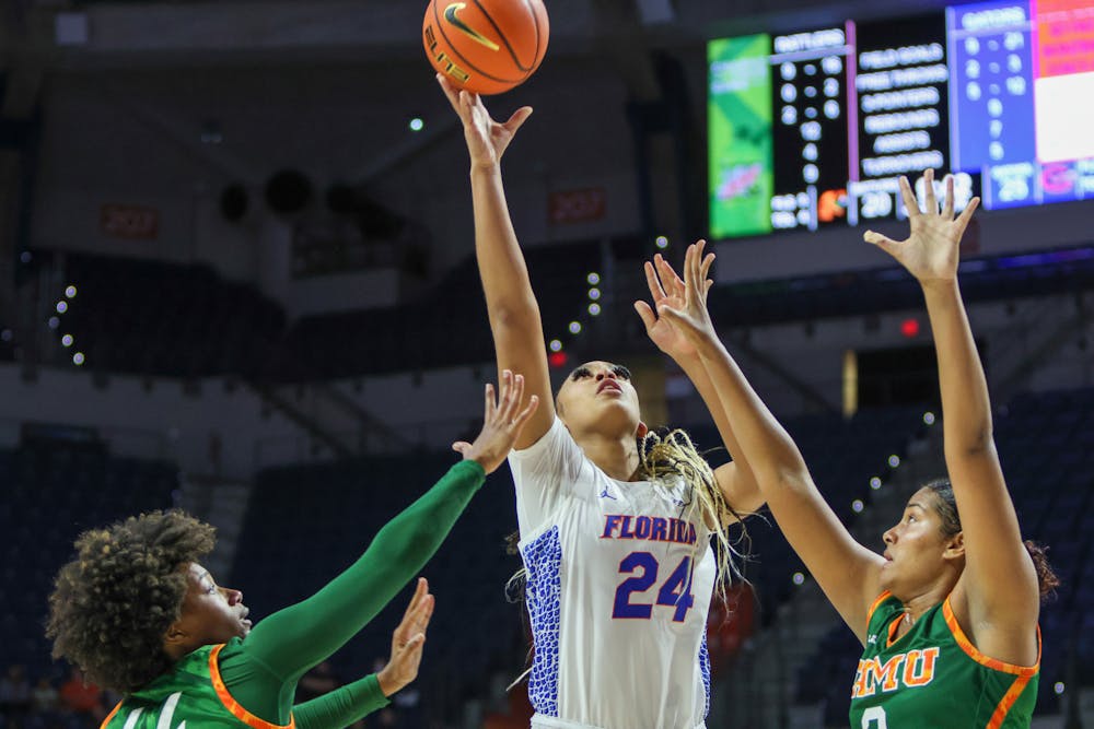 <p>Florida center Ra Shaya Kyle puts up a shot in the Gators&#x27; win over the Florida A&amp;M Rattlers Monday, Nov. 7, 2022.</p>