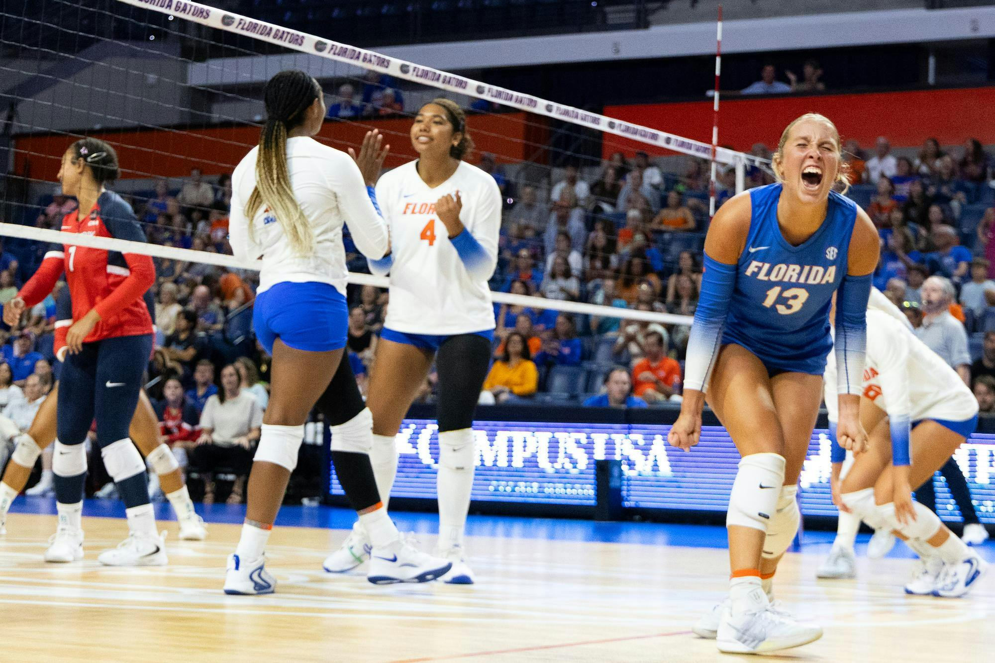 Lily Hayes (13) faces away from the net as she celebrates against Stony Brook University, Aug. 30, 2026, at the Stephen C. O’Connell Center in Gainesville, Fla.