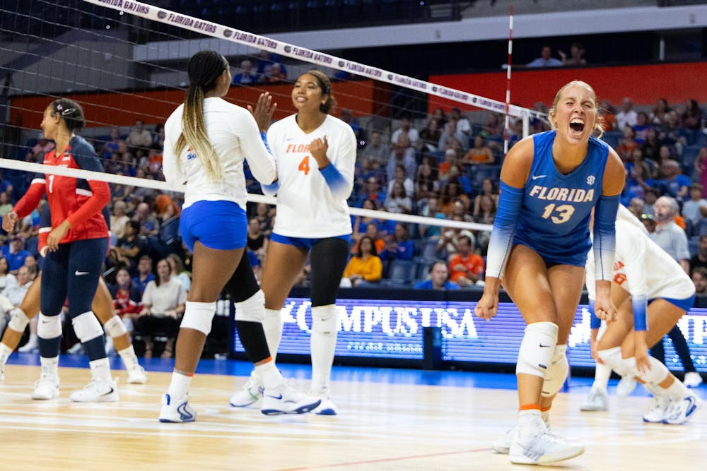 Lily Hayes (13) faces away from the net as she celebrates against Stony Brook University, Aug. 30, 2026, at the Stephen C. O’Connell Center in Gainesville, Fla.