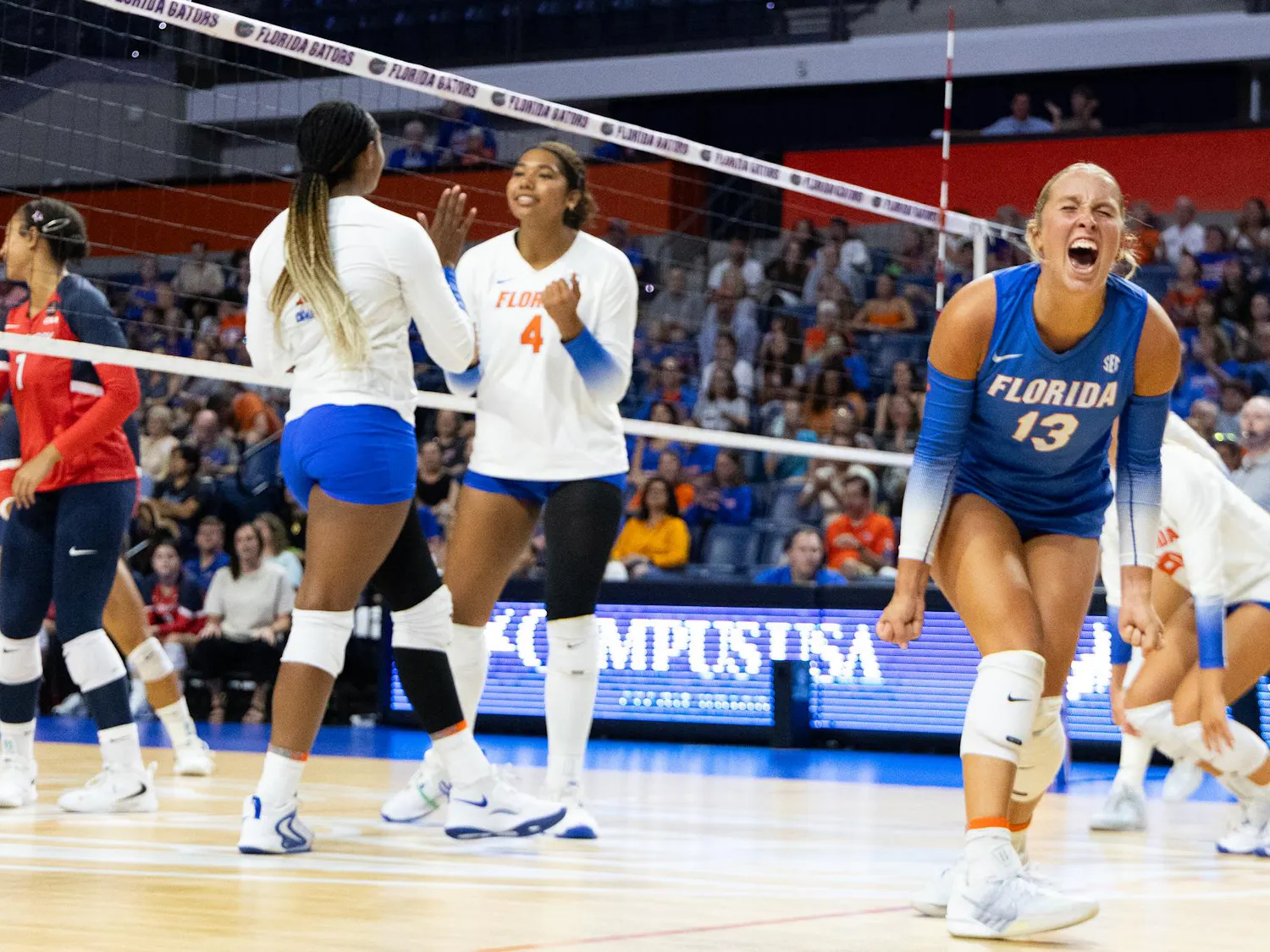 Lily Hayes (13) faces away from the net as she celebrates against Stony Brook University, Aug. 30, 2026, at the Stephen C. O’Connell Center in Gainesville, Fla.