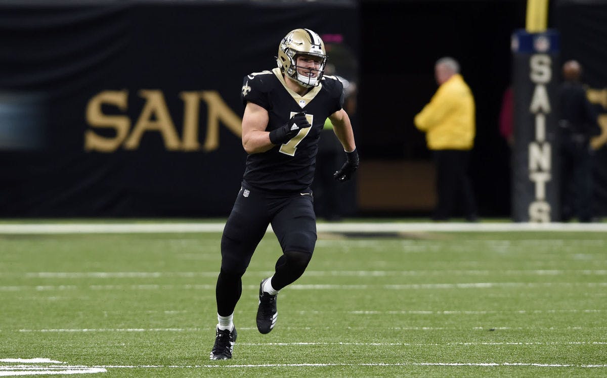 New Orleans Saints third-string quarterback Taysom Hill nearly blocked a punt in Sunday's divisional round playoff game, prompting praise from Fox broadcasters Joe Buck and Troy Aikman.