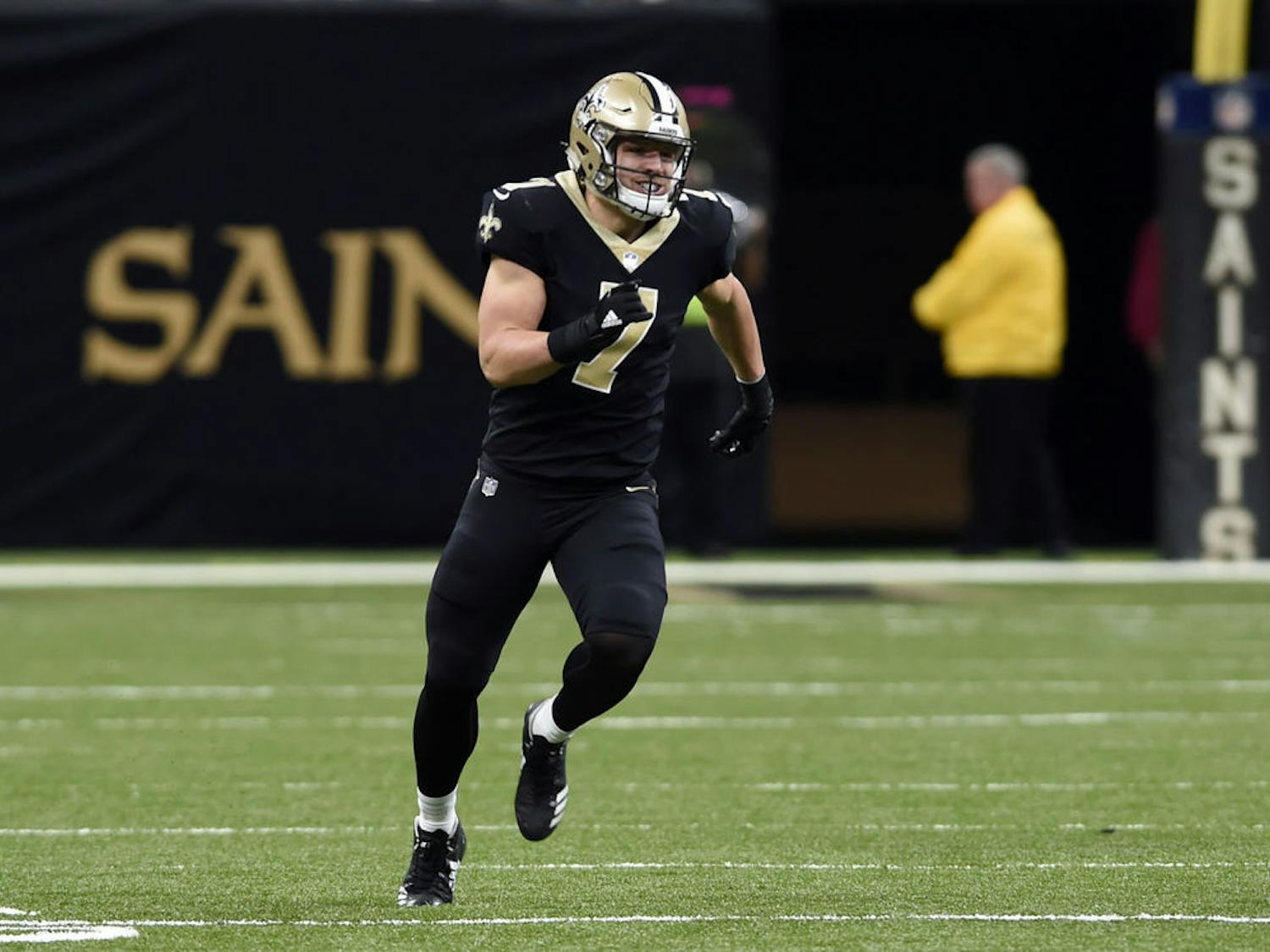 New Orleans Saints third-string quarterback Taysom Hill nearly blocked a punt in Sunday's divisional round playoff game, prompting praise from Fox broadcasters Joe Buck and Troy Aikman.