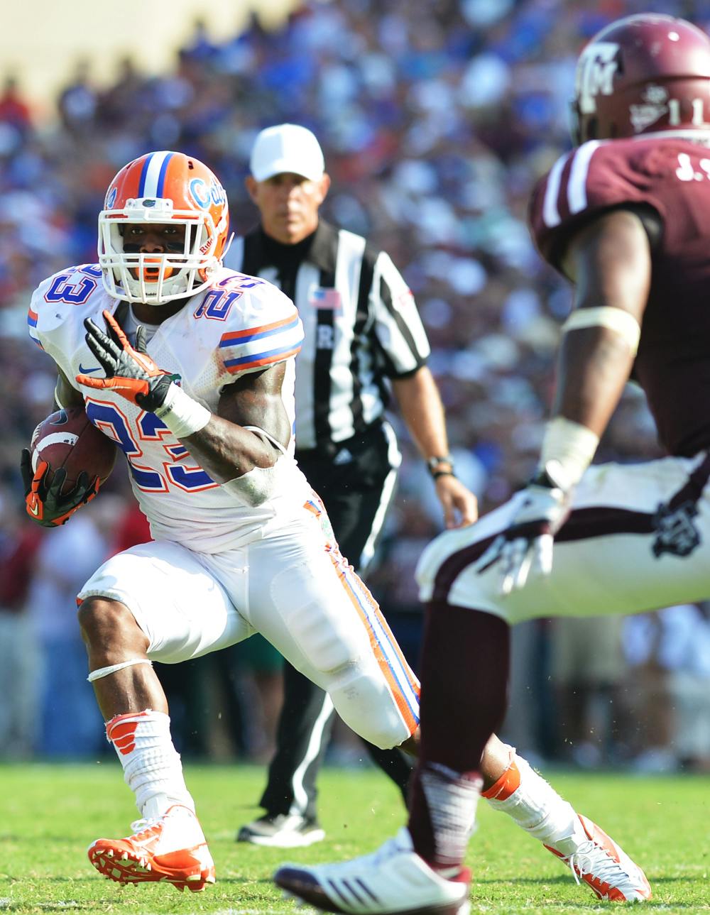 <p>Runningback Mike Gillislee moves the ball against  against Texas A&amp;M on Saturday at Kyle Field. Gillislee rushed for two touchdowns in Saturday's victory against the Aggies.</p>