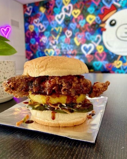 Birdie Box&#x27;s Maui Wowie Sando with grilled pineapple and Sweet and Spicy sauce added. (Courtesy to The Alligator)