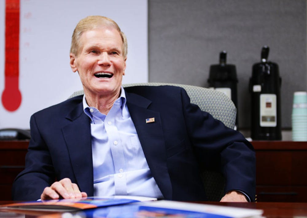 <p>Sen. Bill Nelson banters with Marco Pahor, director of the Institute On Aging, and other UF experts as part of his roundtable discussion for his fact-checking tour across Florida targeted at Medicare and aging reform issues.</p>
