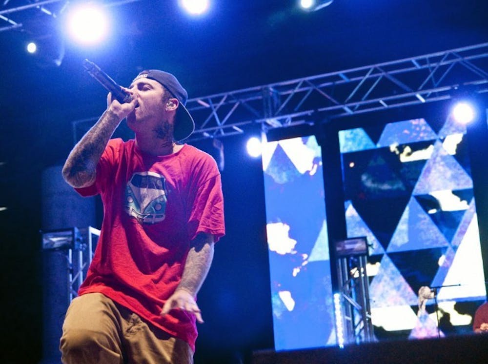 <p>Mac Miller performs at Swampfest on Saturday night on Flavet Field.</p>
