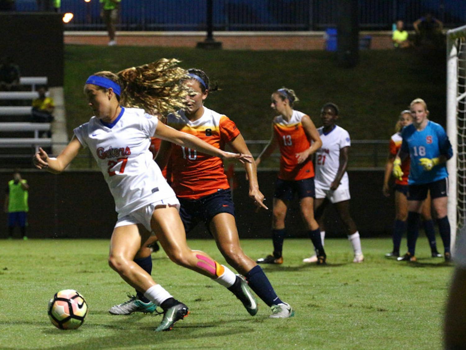 Mayra Pelayo controls the ball with a defender behind her during Florida's 2-1 win against Syracuse on Aug. 27, 2017, at Donald R. Dizney Stadium.