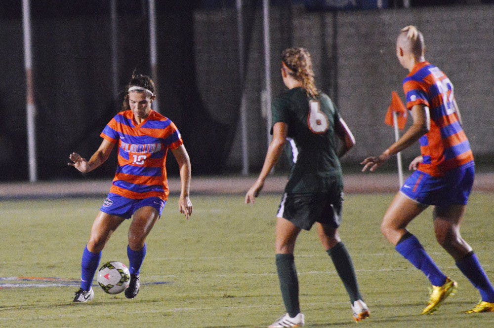 <p>Liz Slattery dribbles the ball during Florida's 3-0 win against Miami on Aug. 22 at James G. Pressly Stadium.</p>