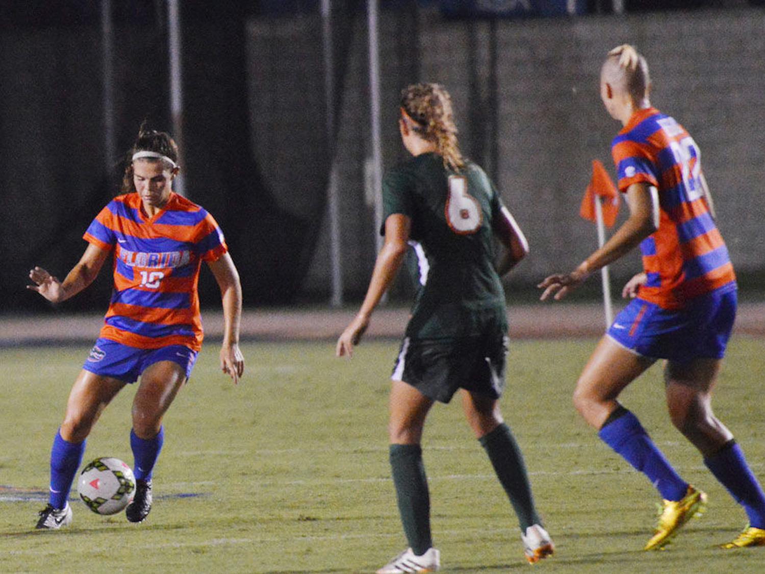 Liz Slattery dribbles the ball during Florida's 3-0 win against Miami on Aug. 22 at James G. Pressly Stadium.