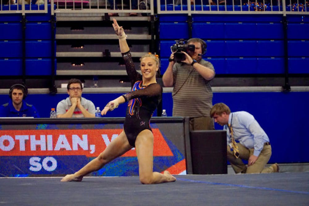 <p>Alex McMurtry performs her floor routine during Florida's loss to LSU on Feb. 26, 2016, in the O'Connell Center.</p>